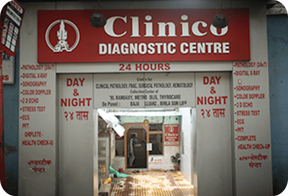 Doctor using Sonography Machine - Clinico Diagnostic Centre